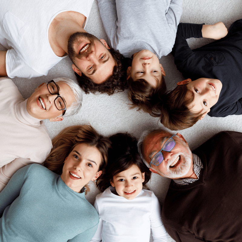 aging empty nester parents with young parents and their children, happy to have estate planning.