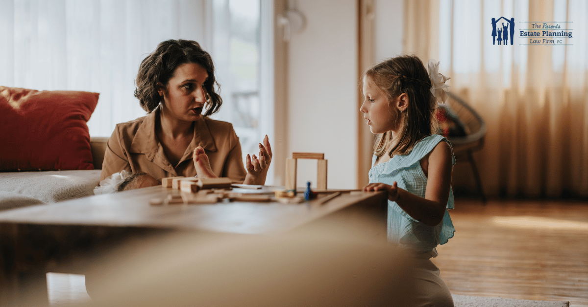 A mother and her young daughter engage in a meaningful conversation in a cozy living room setting. The moment captures their close bond and illustrates why you should talk to your children about death.